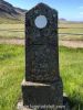 Ólæsilegur legsteinn í Breiðabólstaðarkirkjugarði